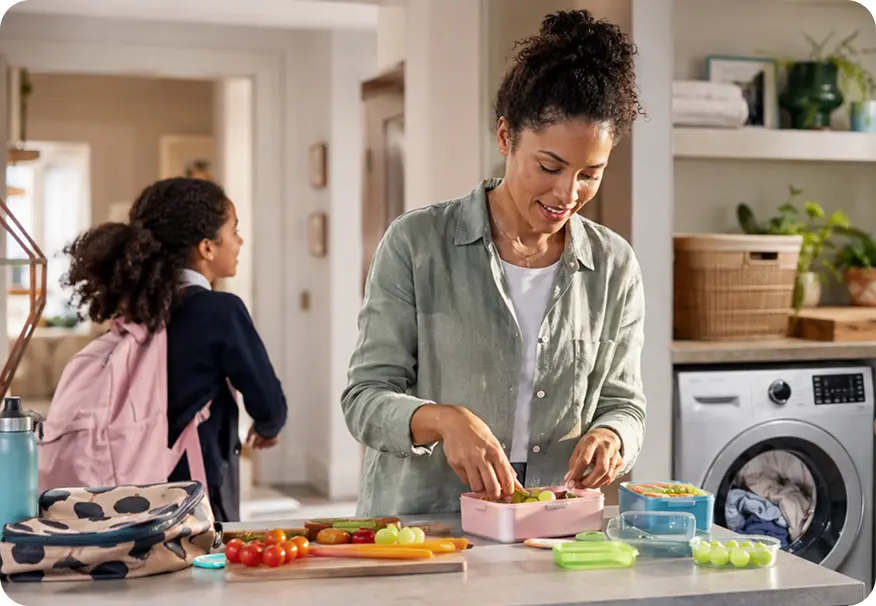 A mother packing a school lunch