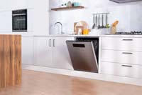 A kitchen featuring a Beko dishwasher with AutoDose technology