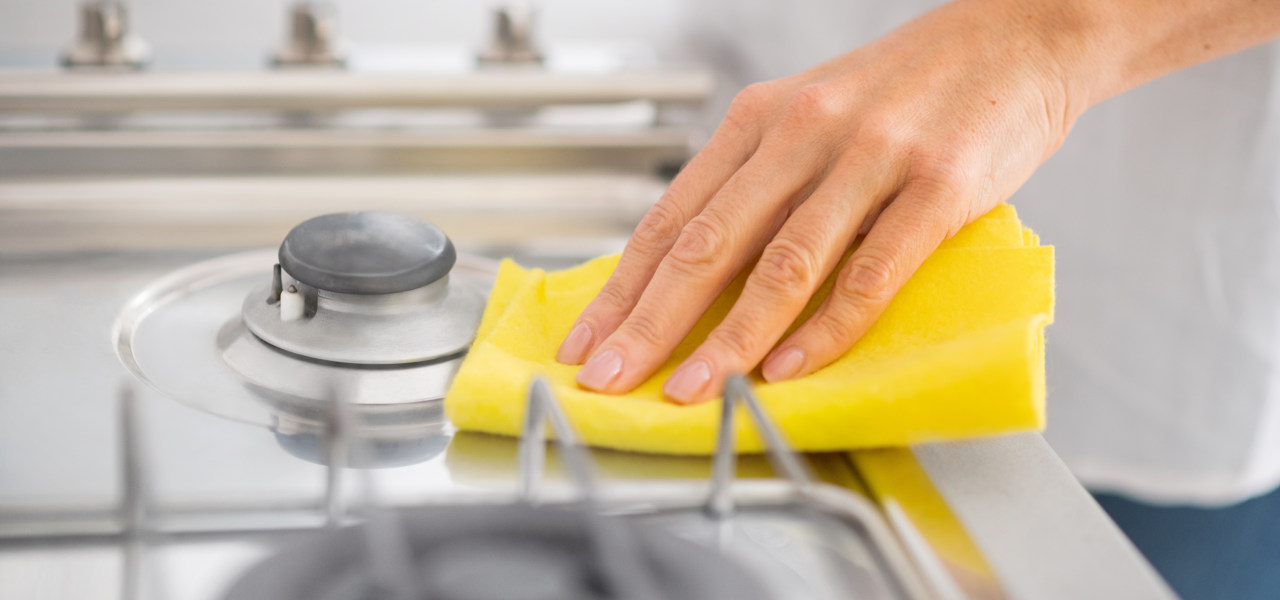 How do I clean a metal gas hob