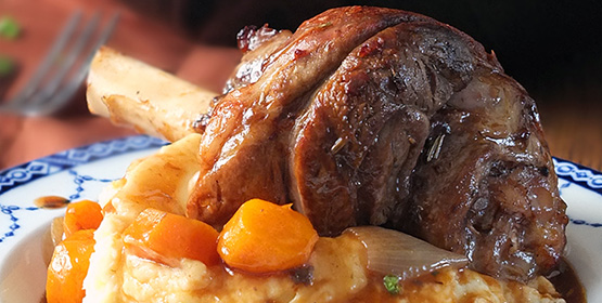 Slow Cooked Lamb Shanks With Vegetables And Gravy