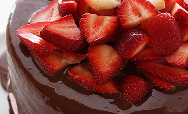chocolate covered ice cream cake with strawberries