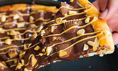 Peanut butter cup dessert pizza